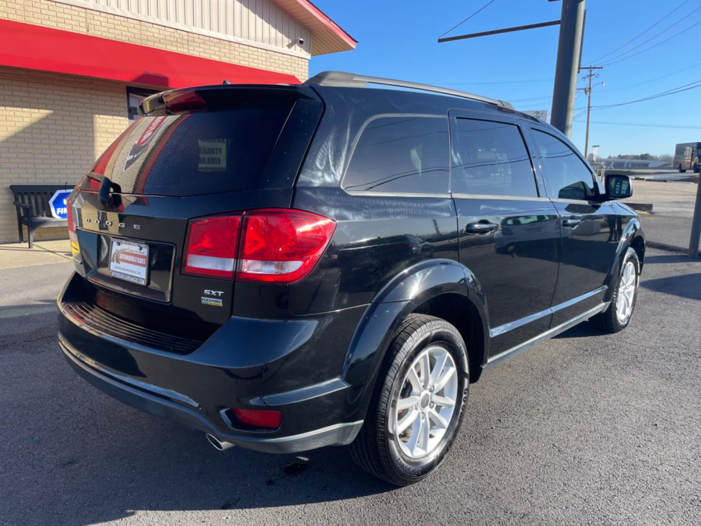 2017 Black Dodge Journey (3C4PDCBGXHT) with an V6, 3.6 Liter engine, Auto, 6-Spd AutoStick transmission, located at 8008 Warden Rd, Sherwood, AR, 72120, (501) 801-6100, 34.830078, -92.186684 - Photo#7